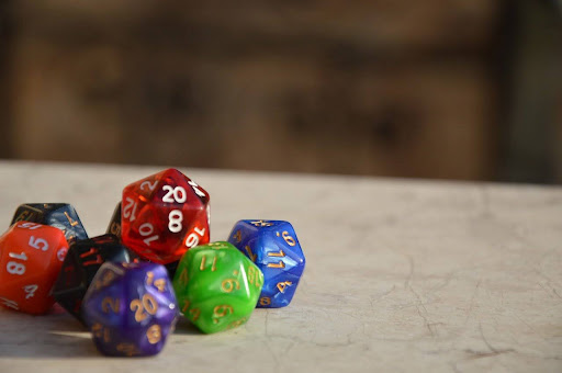 The 14 Must-Have Tools for Dungeon Masters 2 DND Stacks of dices